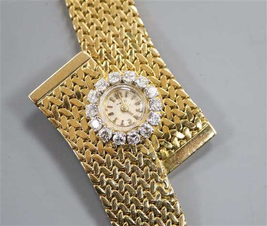 A stylish yellow metal and diamond set dress bracelet watch, 18.5cm.